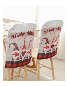 Detail of Christmas chair covers with gnomes, plaid trim and Merry Christmas text
