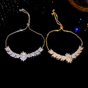 Détail de bracelets fleurs d'épi de blé ajustables avec zircons brillants en or et argent