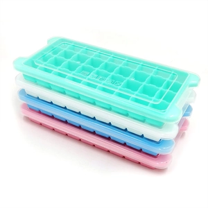 Stack of 4 colorful BPA-free ice cube trays with lids in green, white, blue and pink