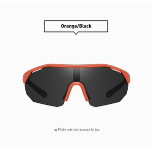 Detail view of sport polarized sunglasses with orange frame and black lens for outdoor