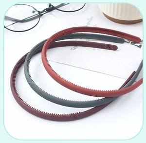Three-piece matte headband set with non-slip teeth in red, grey, and burgundy colors