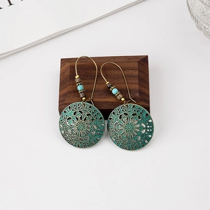 Bohemian bronze hollow carved earrings with turquoise beads and dreamcatcher feathers