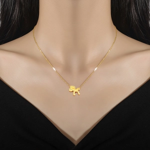 Minimalist titanium steel necklace with gold pony pendant on neck model display