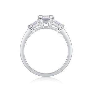 Classic three-stone S925 silver ring featuring an emerald cut moissanite center stone