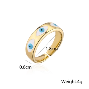 Detailed view of evil eye gold ring with 0.6cm width and 1.8cm diameter specifications