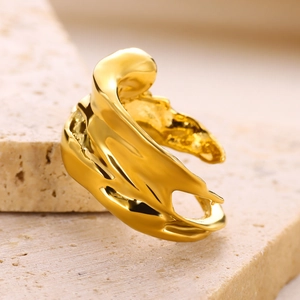 Macro shot of liquid lava style irregular open ring with elegant gold plated finish