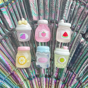 Mini transparent fruit resin bottles set for DIY crafts with glitter and colorful accents