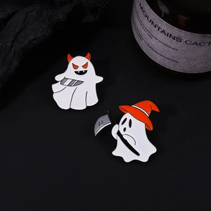 Detail of Halloween ghost pins with witch hat and scythe in dark artistic setting