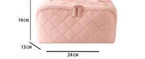 Detailed side view showing specific dimensions of the pink quilted waterproof cosmetic bag.