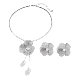 Silver hollow flower jewelry set with pearls including necklace and stud earrings