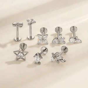 F136 Titanium body piercing studs featuring butterfly, clover and crown designs with zircon