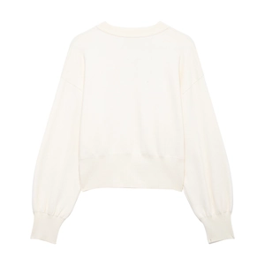 Elegant cream white knit sweater with puff sleeves and ribbed cuffs on white background