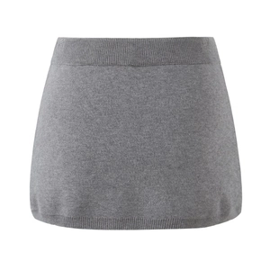Close-up of grey knitted skirt featuring high-quality ribbed waistband and fine needlework