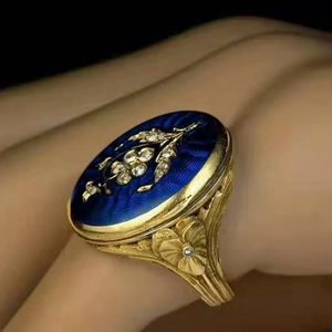 Vintage Victorian style blue enamel ring with gold floral engraving and diamonds