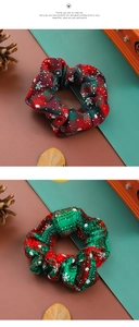 Close-up of festive red and green plaid Christmas hair scrunchies with snowflake patterns