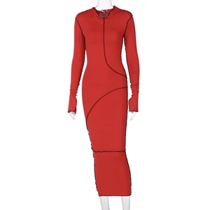 Detailed close-up of a red bodycon hooded dress featuring black contrast stitching details
