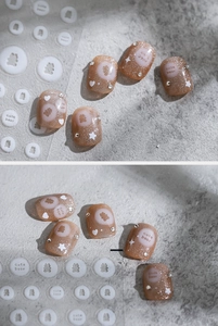 Detail of 5D ultra-thin nail stickers with cute bear patterns and tiny star accents