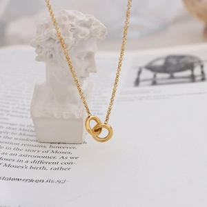Elegant 18K gold-plated double interlocking circle pendant necklace on a fine chain