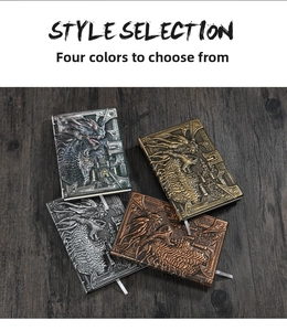 Detailed macro of vintage dragon 3D embossed A5 notebooks in four metallic color finishes
