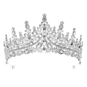 Close-up of silver bridal crown with drop-shaped crystals and sparkling rhinestones