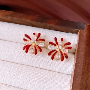 18k gold plated firework stud earrings with red enamel and sparkling zircons