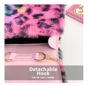Detail of pink leopard plush fabric with magnetic clasp and gold metal hook