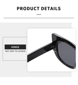 Detail view of reinforced hinges on black cat-eye sunglasses for long-lasting durability