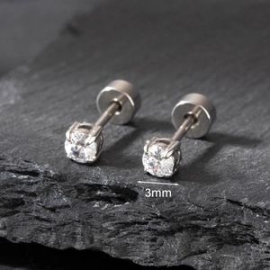 Macro view of 3mm cubic zirconia stud earrings in polished stainless steel
