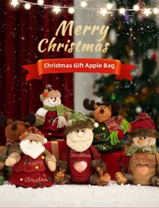 Christmas gift bags with Santa and snowman designs featuring transparent windows for apples