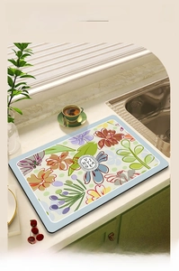 Absorbent floral dish drying mat for kitchen countertop with soft technical fabric finish