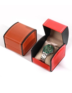 Detail of PU leather watch box with white stitching in red and orange colors