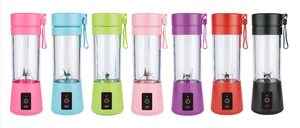 Row of colorful portable blenders in seven vibrant colors with stainless steel blades