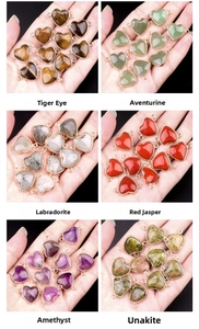 Detailed comparison of heart gemstones like tiger eye and amethyst with double loops