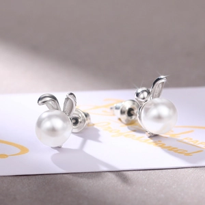 Cute bunny ear pearl stud earrings in polished silver finish for women fashion