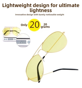 Detail of ultra-light 20g aviator sunglasses with yellow lenses and gold metal frames