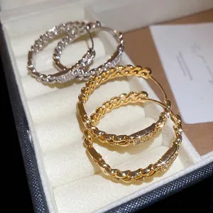 18k gold plated twist hoop earrings with sparkling cubic zirconia in gold and silver set