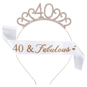 Close-up of rose gold 40 & Fabulous birthday tiara and white satin sash with gold lettering
