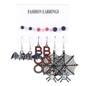 Halloween earring set featuring black bats, spiders, and crystal BOO charms on a card