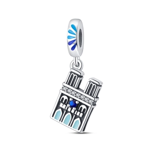 Detailed view of luminous Notre Dame charm with blue enamel and sparkling zircons