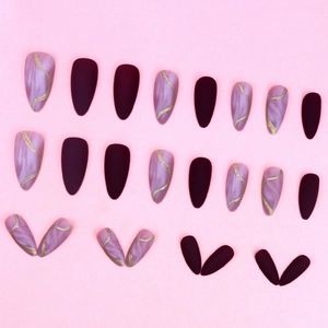 Matte purple almond press-on nails with marble texture and gold foil patterns
