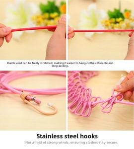 Detail view of pink elastic clothesline with anti-slip clips and stainless steel hooks