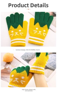 Detail of yellow and green knit gloves for kids with cat design and elastic cuffs