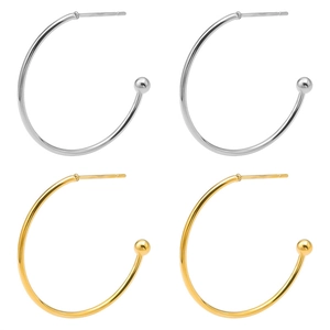 Detail of 18K gold and silver stainless steel hoop earrings with sphere end beads