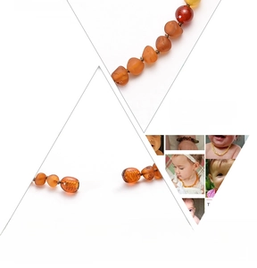 Detail of Baltic amber baby necklace showing safety screw clasp and double-knotting