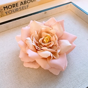 Elegant pink floral hair claw clip made of fabric silk with detailed yellow stamens