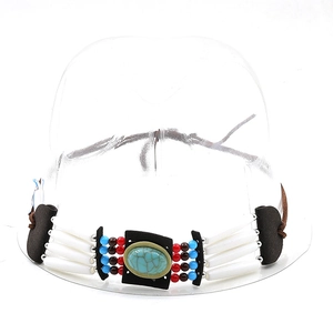 Close-up of ethnic beaded hat band with turquoise stone and white bone-like beads