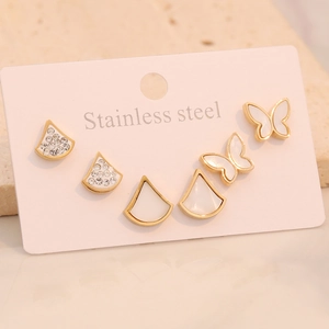 Three pairs of golden stainless steel stud earrings with geometric heart and butterfly motifs
