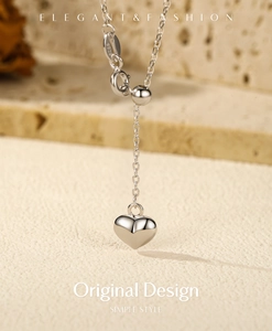 Detail view of S925 sterling silver Y-shaped necklace with heart pendant and spring clasp