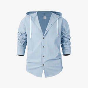 Macro detail of vertical stripe linen texture and dark buttons on light blue hooded shirt