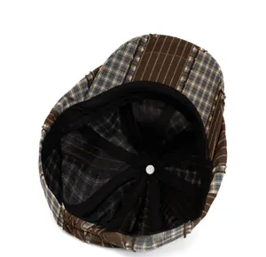 Detail of British style newsboy hat showing breathable mesh lining and inner structure